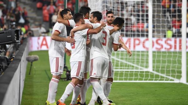 Iran's players celebrate their opening goal during the 2019 AFC Asian Cup quarter-final football match between China and Iran at the Mohammed Bin Zayed Stadium Stadium in Abu Dhabi on January 24, 2019.
Khaled DESOUKI / AFP Iran's players celebrate their opening goal during the 2019 AFC Asian Cup quarter-final football match between China and Iran at the Mohammed Bin Zayed Stadium Stadium in Abu Dhabi on January 24, 2019.
Khaled DESOUKI / AFP