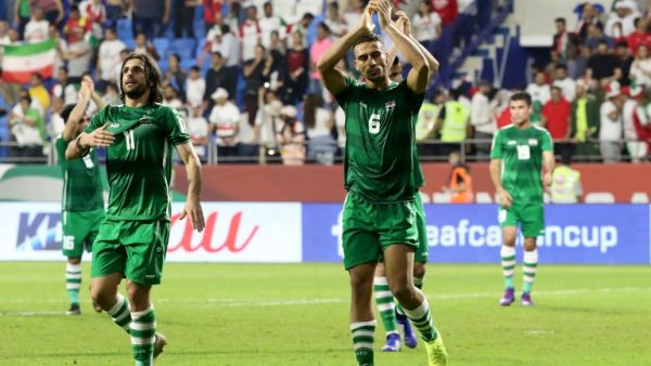 Result between bitter rivals sees Iranians head into Round of 16 as Group D winners