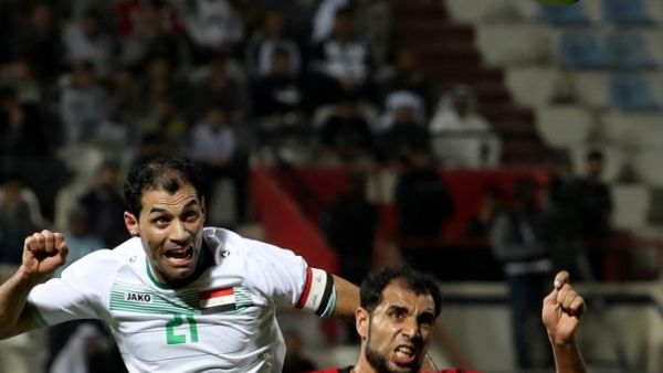 Iraq's Saad Abdul-Amir (L) vies for the ball with Yemen's Mohammad Fuad during the 2017 Gulf Cup of Nations football match between Iraq and Yemen at the Kuwait Stadium in Kuwait City on December 29, 2017.
Yasser Al-Zayyat / AFP