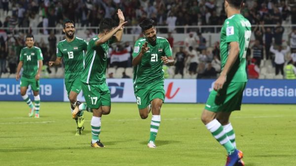 Iraq's forward Alaa Abbas (2nd-R) celebrates his goal, his team's third, during the 2019 AFC Asian Cup group D football match between Yemen and Iraq at Sharjah stadium in Sharjah on January 12, 2019.
Karim Sahib / AFP