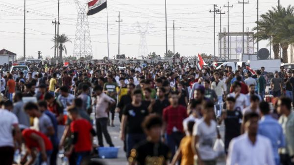Football fans arrive at Basra Sports City stadium in the southern Iraqi city on March 21, 2018 to attend the international friendly match between Iraq and Qatar.
HAIDAR MOHAMMED ALI / AFP