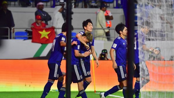 Japan's players celebrate their goal during the 2019 AFC Asian Cup quarter-final football match between Vietnam and Japan at the Al-Maktoum Stadium in Dubai on January 24, 2019.
Giuseppe CACACE / AFP
