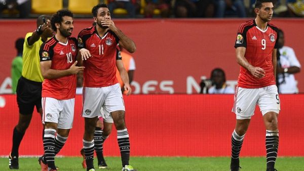 Egypt's midfielder Mahmoud Abdel-Moneim (C) celebrates with teammates after scoring a goal during the 2017 Africa Cup of Nations quarter-final football match between Egypt and Morocco in Port-Gentil on January 29, 2017.
Justin TALLIS / AFP