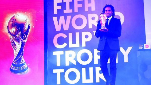 Retired French footballer Christian Karembeu holds the FIFA World Cup Trophy during a ceremony in Lahore on February 3, 2018. The FIFA World Cup Trophy Tour is heading to 50 countries across six continents before returning to the host country in May, ahead of the 2018 FIFA World Cup in Russia.
ARIF ALI / AFP