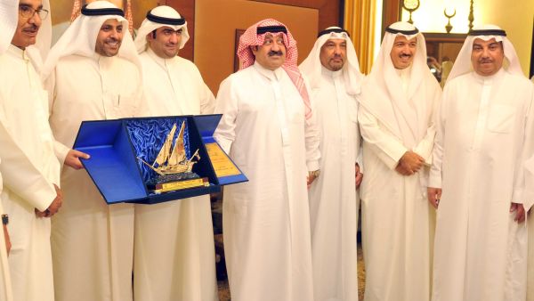 Minister of Information and Minister of State for Youth Affairs Mohammad Al-Jabri at a ceremony, honoring Minister of Commerce and Industry Khaled Al-Roudhan (Photo: KUNA)