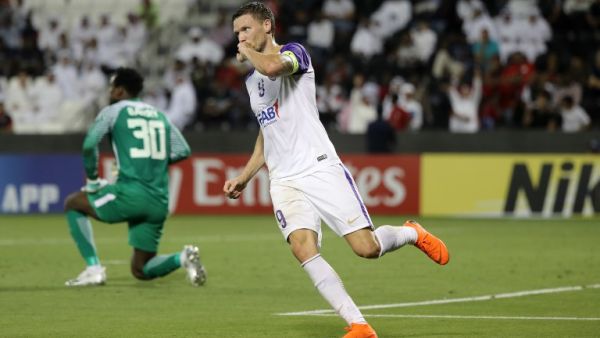 Al Ain FC's Swedish forward and captain Marcus Berg celebrates after scoring a goal against Al-Rayyan SC during their Asian Champions League football match at Jassim Bin Hamad Stadium in Doha on April 16, 2018.
KARIM JAAFAR / AFP