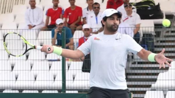 Oman's Mohammed Al Nabhani in action during his match against Sree-Amol Roy of Bangladesh at the Sultan Qaboos Sports Complex on Monday. Photo - Supplied