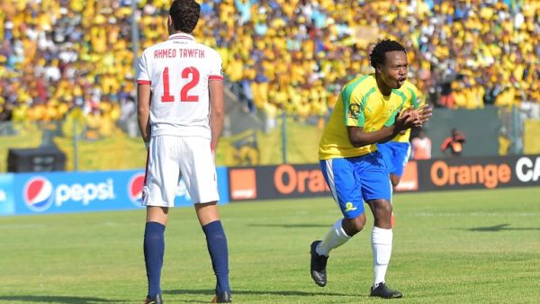 Mamelodi Sundowns Percy Tau (R) celebrates after scoring a goal during the CAF Championship final football match on October 15, 2016 at Atteridgville Stadium in Pretoria, South Africa.
STRINGER / AFP