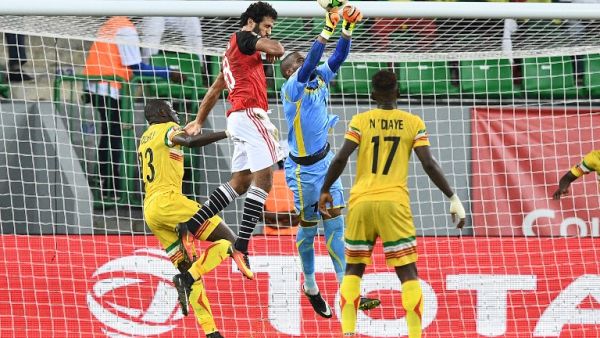 Mali's goalkeeper Oumar Sissoko (C-R) saves a shot on goal by Egypt's forward Marwan Mohsen (C-L) next to Mali's defender Ousmane Coulibaly (L) and Mali's midfielder Mamoutou N'Diaye (R) during the 2017 Africa Cup of Nations group D football match between Mali and Egypt in Port-Gentil on January 17, 2017.
Justin TALLIS / AFP