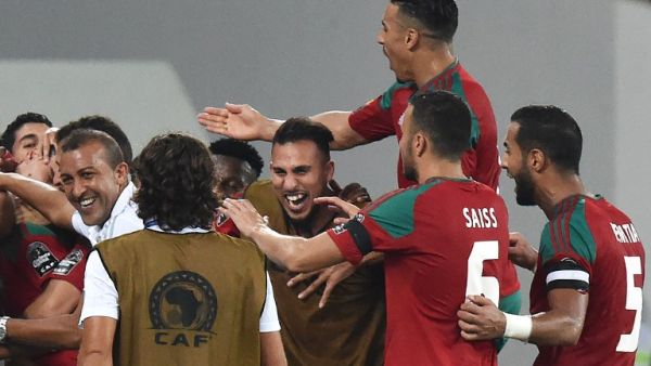 Morocco's players celebrate their third goal during the 2017 Africa Cup of Nations group C football match between Morocco and Togo in Oyem on January 20, 2017.
ISSOUF SANOGO / AFP
