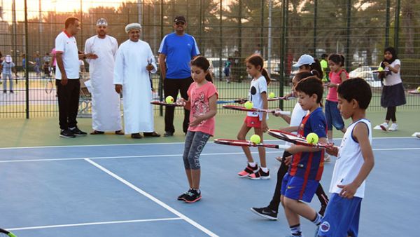 Children take part in a tennis training programme held at Sultan Qaboos Sports Complex on Monday. (Photo: Oman Tribune)