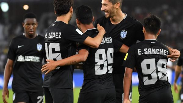 CF Pachuca's Mexican forward Roberto De La Rosa (C) celebrates with his teammates after scoring a goal during the third-place play-off football match of the FIFA Club World Cup UAE 2017 between Al-Jazira and CF Pachuca at the Bin Zayed Stadium in Abu Dhabi on December 16, 2017.

GIUSEPPE CACACE / AFP
