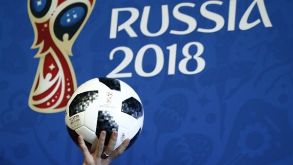 Presenter holds the official match ball for the 2018 FIFA World Cup Russia (Photo: yenisafak.com)