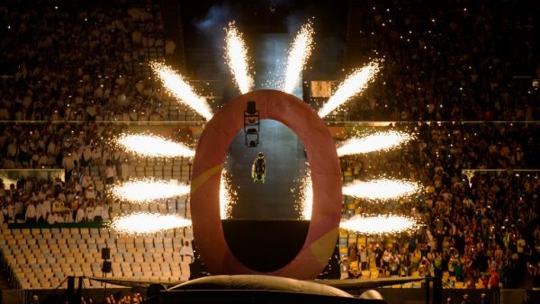 Aaron Wheelz, an extreme wheelchair athlete, goes down a MegaRamp and tears through the panel with the number zero, marking the start of the Opening Ceremony of the Rio 2016 Paralympic Games at the Maracana Stadium in, Rio de Janeiro, Brazil, on September 7, 2016. Photo by Bob Martin/OIS/IOC via AFP. RESTRICTED TO EDITORIAL USE.
Bob Martin for OIS / OIS/IOC / AFP