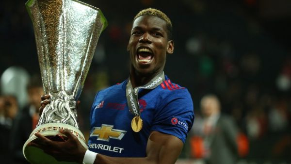 Manchester United's French midfielder Paul Pogba celebrates with the trophy after his team won the UEFA Europa League final football match Ajax Amsterdam v Manchester United on May 24, 2017 at the Friends Arena in Solna outside Stockholm.
Soren Andersson / AFP