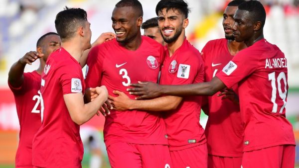 Qatar's defender AbdelKarim Hassan (3rd-L) celebrates after scoring a goal during the 2019 AFC Asian Cup group E football match between North Korea and Qatar at the Khalifa bin Zayed stadium in al-Ain on January 13, 2019.
Giuseppe CACACE / AFP