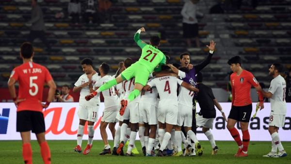Qatar's players celebrate their victory during the 2019 AFC Asian Cup quarter-final football match between South Korea and Qatar at Zayed Sports City in Abu Dhabi on January 25, 2019.
Khaled DESOUKI / AFP