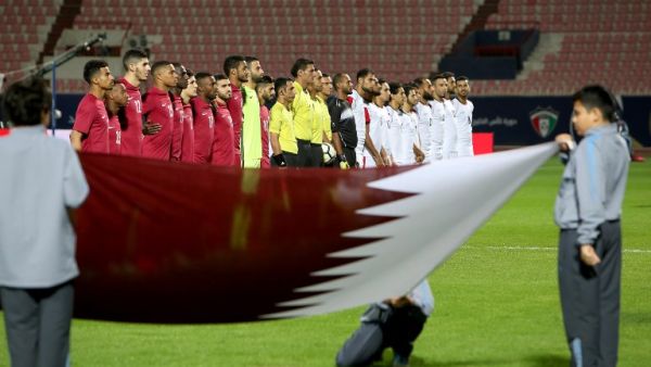 Qatar's and Yemen's starting eleven pose for a group picture ahead of the 2017 Gulf Cup of Nations football match between Qatar and Yemen at the Sheikh Jaber al-Ahmad Stadium in Kuwait City on December 23, 2017.
Yasser Al-Zayyat / AFP