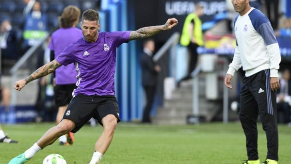 The centre-back is happy with the atmosphere in the dressing room under the French coach and feels he has proved to be the right man to lead the team