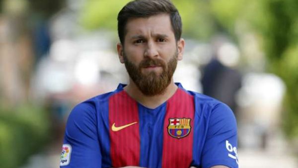 An Iranian student who bears an uncanny resemblance to the Barcelona star was taken to a police station after too many people wanted pictures with him (Photo: goal.com)