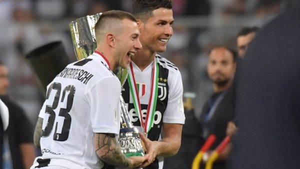  Juventus will return to Turin with the Supercoppa Italiana in tow after Cristiano Ronaldo's header sank AC Milan. 