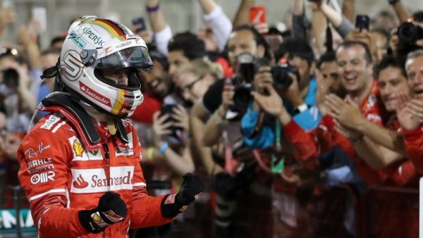 Ferrari's German driver Sebastian Vettel celebrates after winning the Bahrain Formula One Grand Prix at the Sakhir circuit in Manama on April 16, 2017
KARIM SAHIB / AFP