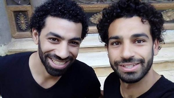 The duo had identical smiles, identical hair, identical beards, and was wearing identical shirts to make things more confusing.