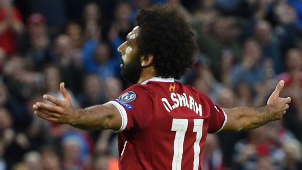 Liverpool's Egyptian midfielder Mohamed Salah celebrates scoring his team's second goal during the Champions League qualifier, second leg match between Liverpool and Hoffenheim at Anfield stadium in Liverpool on August 23, 2017.
Oli SCARFF / AFP