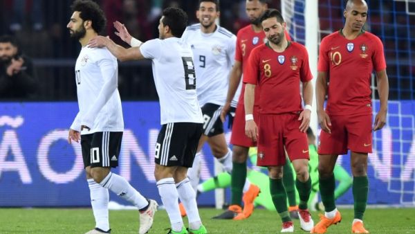 Egypt's forward Mohamed Salah (L) celebrates after scoring a goal during the international friendly football match between Portugal and Egypt at Letzigrund stadium in Zurich on March 23, 2018.
Fabrice COFFRINI / AFP