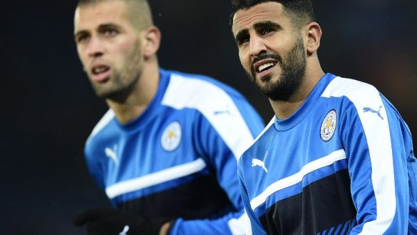 Algerian striker Islam Slimani (L) and compatriot midfielder Riyad Mahrez