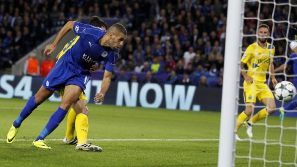 Leicester City's Algerian striker Islam Slimani heads the ball to score his team's first goal during the UEFA Champions League group G football match between Leicester City and Porto at the King Power Stadium in Leicester, central England on Septmeber 27, 2016.
Ian Kington / AFP