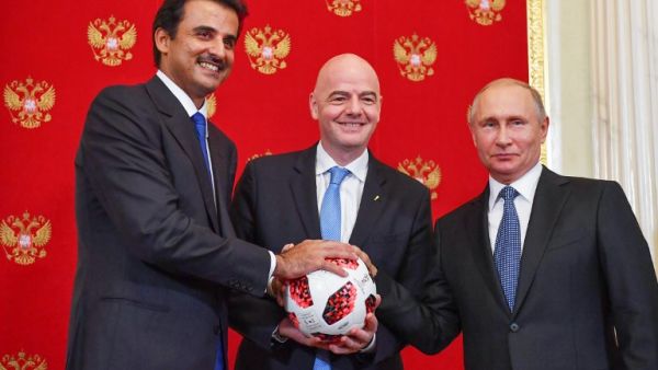 (From L) Emir of Qatar Sheikh Tamim bin Hamad Al-Thani, FIFA President Gianni Infantino and Russian President Vladimir Putin pose for a photography during a symbolic transfer of the authority to Qatar to host the World Cup 2022 at the Kremlin in Moscow on July 15, 2018.
Yuri KADOBNOV / POOL / AFP
