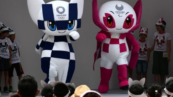 Mascots for the Tokyo 2020 Olympics Games Miraitowa (L) and Someity appear at their debut event in Tokyo on July 22, 2018. The organisers of the Tokyo 2020 Olympics and Paralympics Games announced the names of the mascots on July 22.
Kazuhiro NOGI / AFP