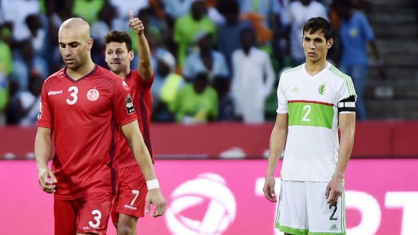Tunisia's midfielder Youssef Msakni (L) gives a thumbs-up next to Algeria's defender Aissa Mandi at the end of the 2017 Africa Cup of Nations group B football match between Algeria and Tunisia in Franceville on January 19, 2017.
KHALED DESOUKI / AFP