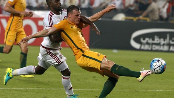 UAE's Ismail al-Hammadi (L) vies with Australia's Brad Smith during their World Cup 2018 Asia qualifying football match United Arab Emirates versus Australia on September 6, 2016 at the Mohammed Bin Zayed Stadium in Abu Dhabi.
KARIM SAHIB / AFP