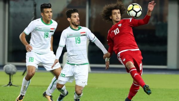 UAE's Omar Abdulrahman (R) kicks the ball as Iraq's Mahdi Kamel (C) and Amjad Attwan defend during the 2017 Gulf Cup of Nations semi-final football match between Iraq and UAE at the Sheikh Jaber al-Ahmad Stadium in Kuwait City on January 2, 2018.
Yasser Al-Zayyat / AFP