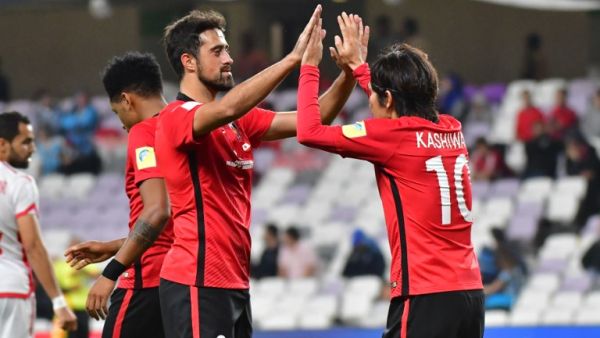 Urawa Reds' Japanese midfielder Yosuke Kashiwagi (L) celebrates after scoring a goal with Urawa Reds' Brazilian defender Mauricio Antonio during the fifth place FIFA Club World Cup UAE 2017 football match Wydad Casablanca vs Urawa Reds at Hazza Bin Zayed Stadium on December 12, 2017 in Al Ain.
GIUSEPPE CACACE / AFP