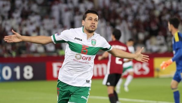 FC Lokomotiv's Sardor Mirzayev celebrates after scoring a goal during the AFC Champions League football match between Al-Wahda and FC Lokomotiv at the Sheikh Zayed Sports City Stadium in Abu Dhabi on April 3, 2018.
KARIM SAHIB / AFP