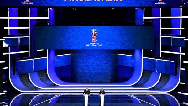 FIFA president Gianni Infantino (L) and Russian President Vladimir Putin speak on stage ahead of the Final Draw for the 2018 FIFA World Cup football tournament at the State Kremlin Palace in Moscow on December 1, 2017. The 2018 FIFA World Cup will be held from June 14 and July 15, 2018, in 11 Russian cities.
Mladen ANTONOV / AFP