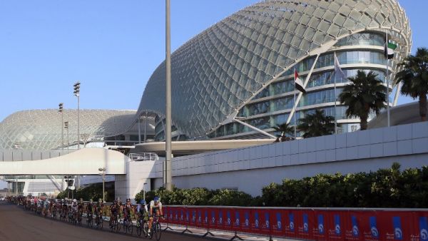 Cyclists ride their bikes during the Abu Dhabi tour from the Yas Marina Circuit to Yas Mall where the tour finishes in the Emirati capital Abu Dhabi, on October 11, 2015. AFP PHOTO / STR
STR / AFP