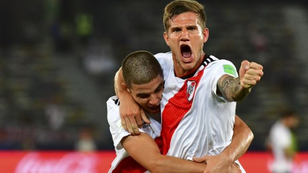 Argentina's River Plate Bruno Zuculini (R) celebrates his goal during their match for third place in the FIFA Club World Cup football competition at the Zayed Sports City Stadium in Abu Dhabi, the capital of the United Arab Emirates, on December 22, 2018.
Giuseppe CACACE / AFP