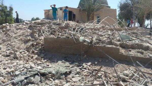 A photo showing the wreckage of the shrine in the Syrian town of Busaira. (Photo courtesy of the Syrian Observatory for Human Rights)