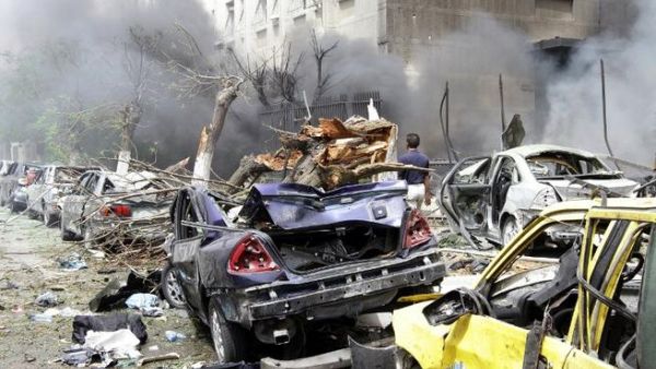 Damascus is rocked by a huge car bomb, which was followed by intense gunfire (AFP/ Louai Beshara)