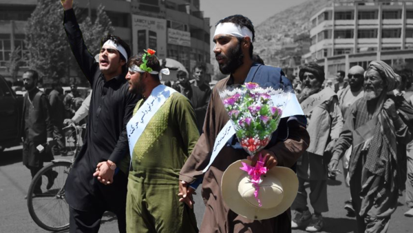 Peace activists in Afghanistan marched hundreds of miles through the country (AFP/FILE)