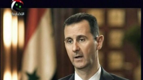 Bashar al-Assad gives an interviews on 17 April (Al-Ikhbariya/AFP)
