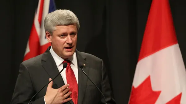 Canada's PM Stephen Harper made an unexpected visit to Iraq, where he met with his Iraqi counterpart Haider al-Abadi Saturday.  (AFP/David Rowland)