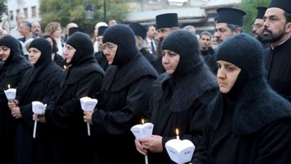The photo shows Greek Orthodox nuns at the Meriamiah Church in Damascus on December 9, 2012. [alalam]
