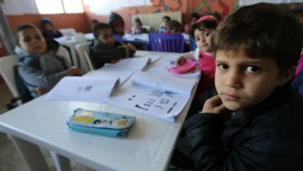 There are 2.1 million children out of school in Syria and 700,000 in neighboring countries. (File photo)
