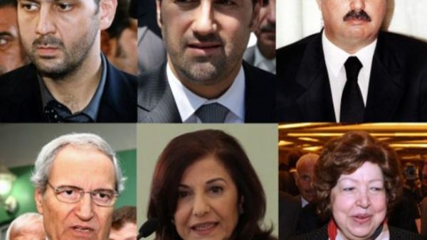 رستم غزالة، رامي مخلوف، ماهر الاسد،نجاح العطار،بثينة شعبان وفاروق الشرع/أ.ف.ب