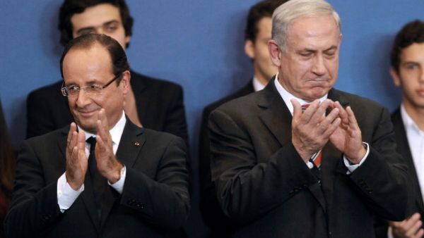 French President Francois Hollande  and Israeli Prime Minister Benjamin Netanyahu. {Bob Edme/Getty Images]